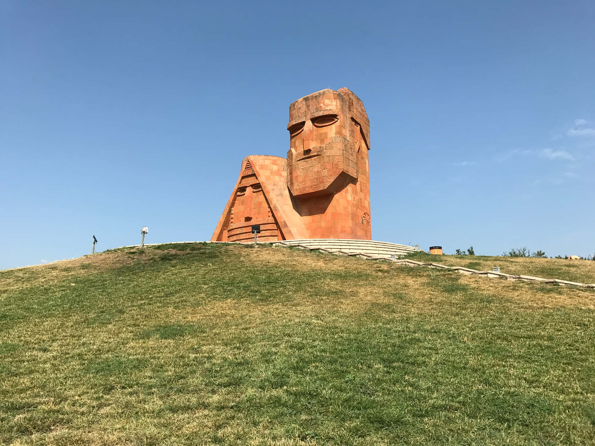 Majestic View Of We Are Our Mountains Monument Background