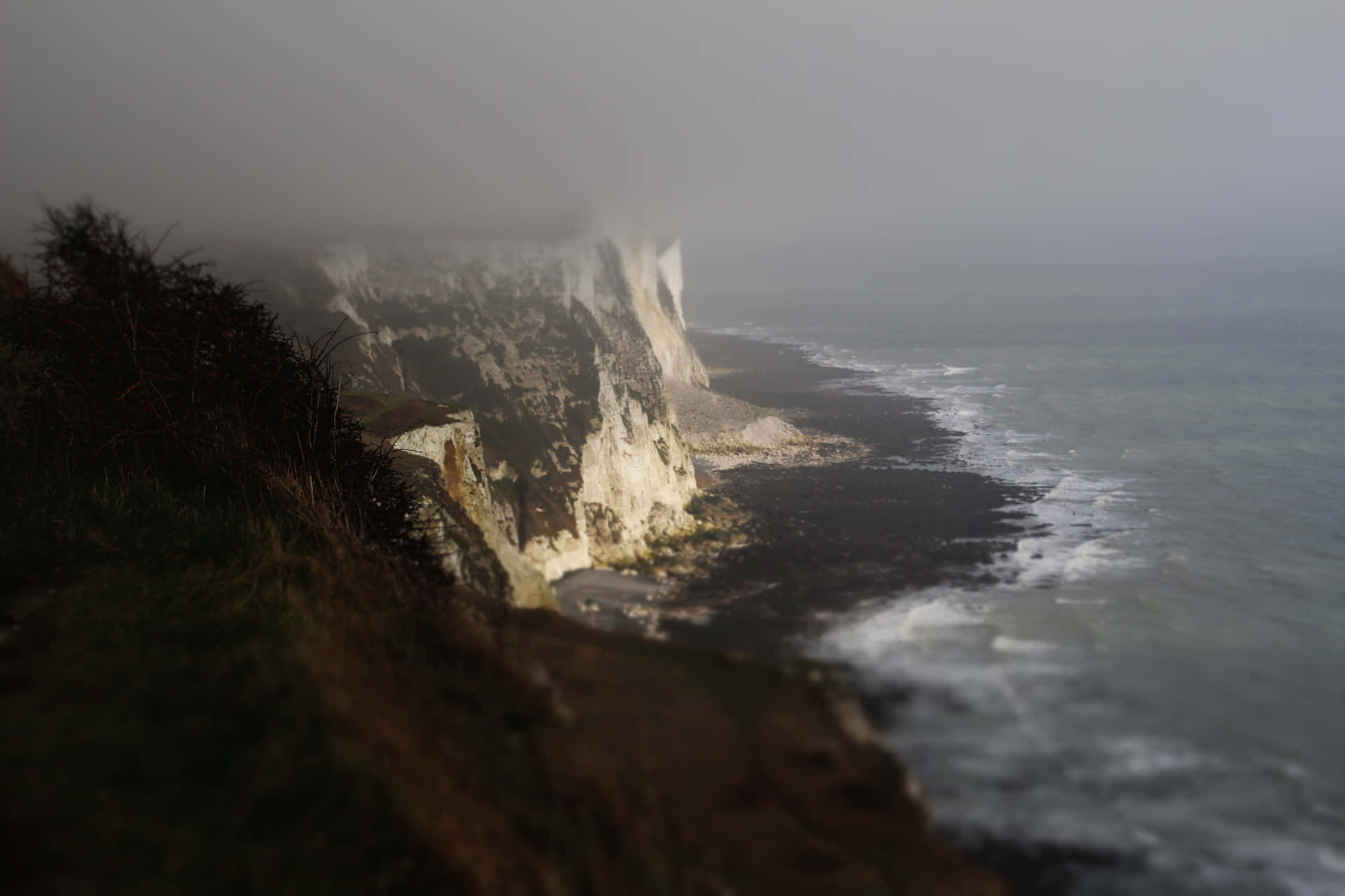 Majestic White Cliffs Of Dover In Stormy Weather Background