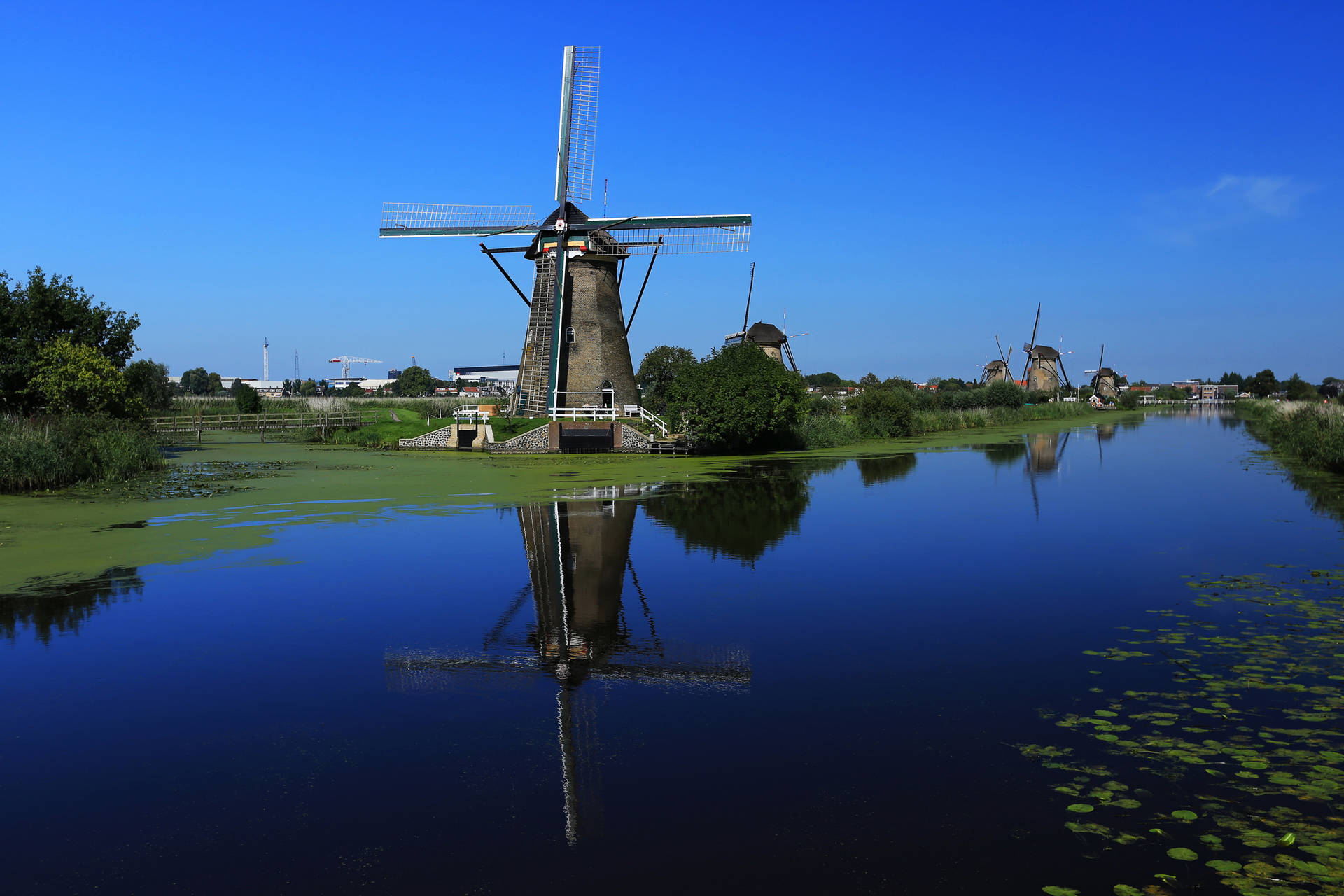 Majestic Windmills At Kinderdijk, Netherlands Background