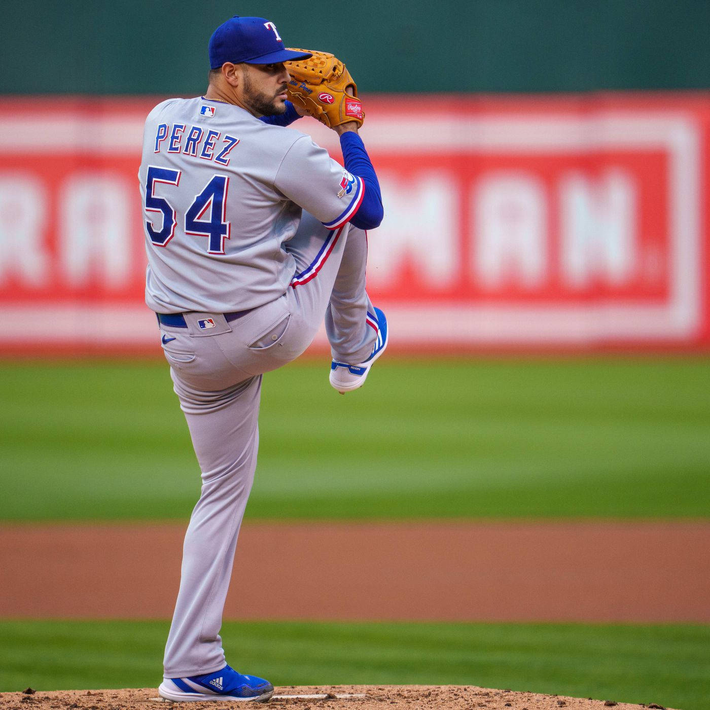 Major League Baseball Player, Martin Perez, Perfecting His Leg Lift During Training Background