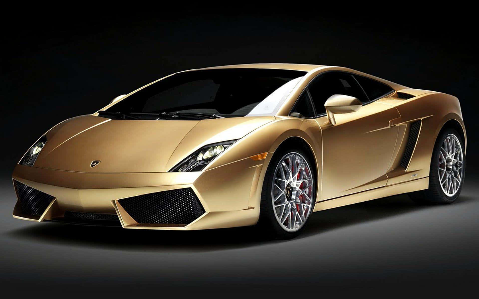 Make A Statement With The Dazzling Gold Lamborghini Background