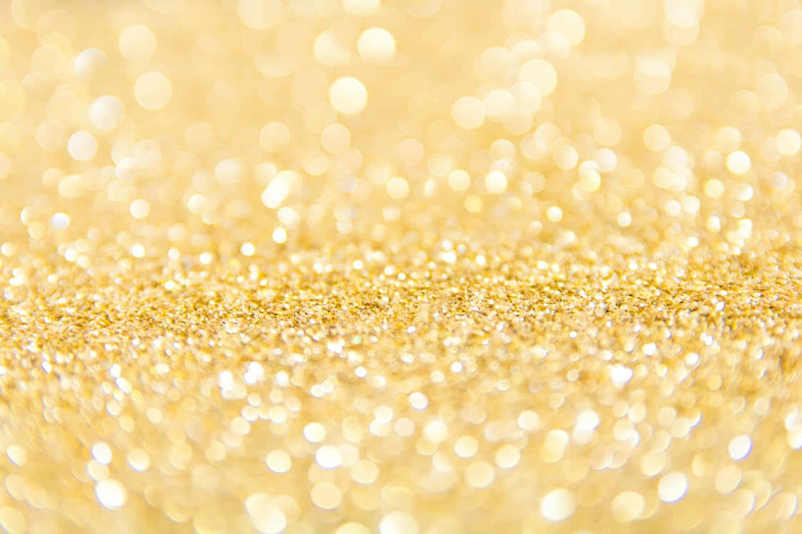 Make Your Artwork Shine With Yellow Glitter Background
