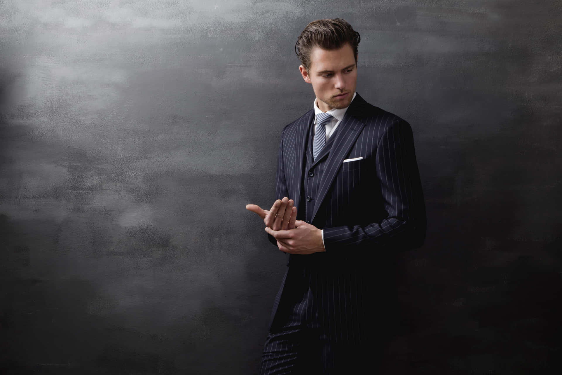 Making Outstanding Style An Art In The Loro Piana Pinstripe Suit Background