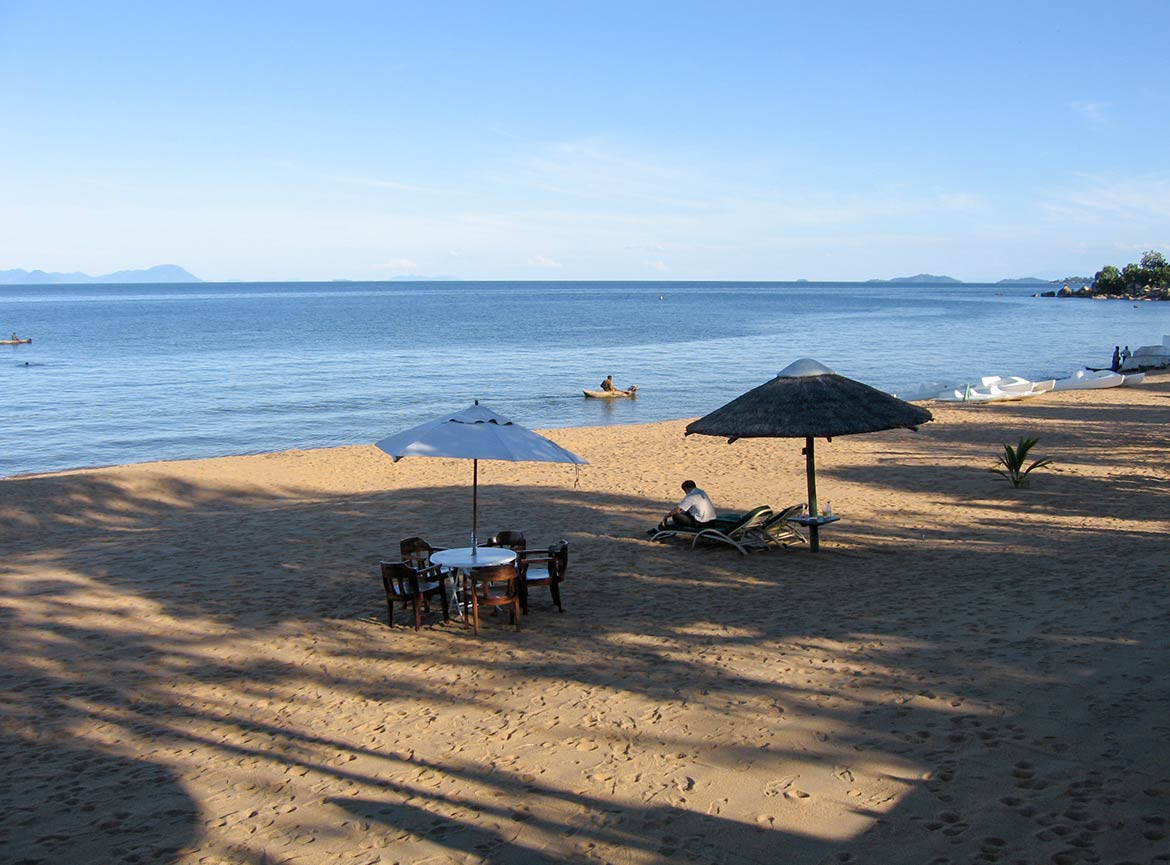 Malawi Beach Umbrellas Background