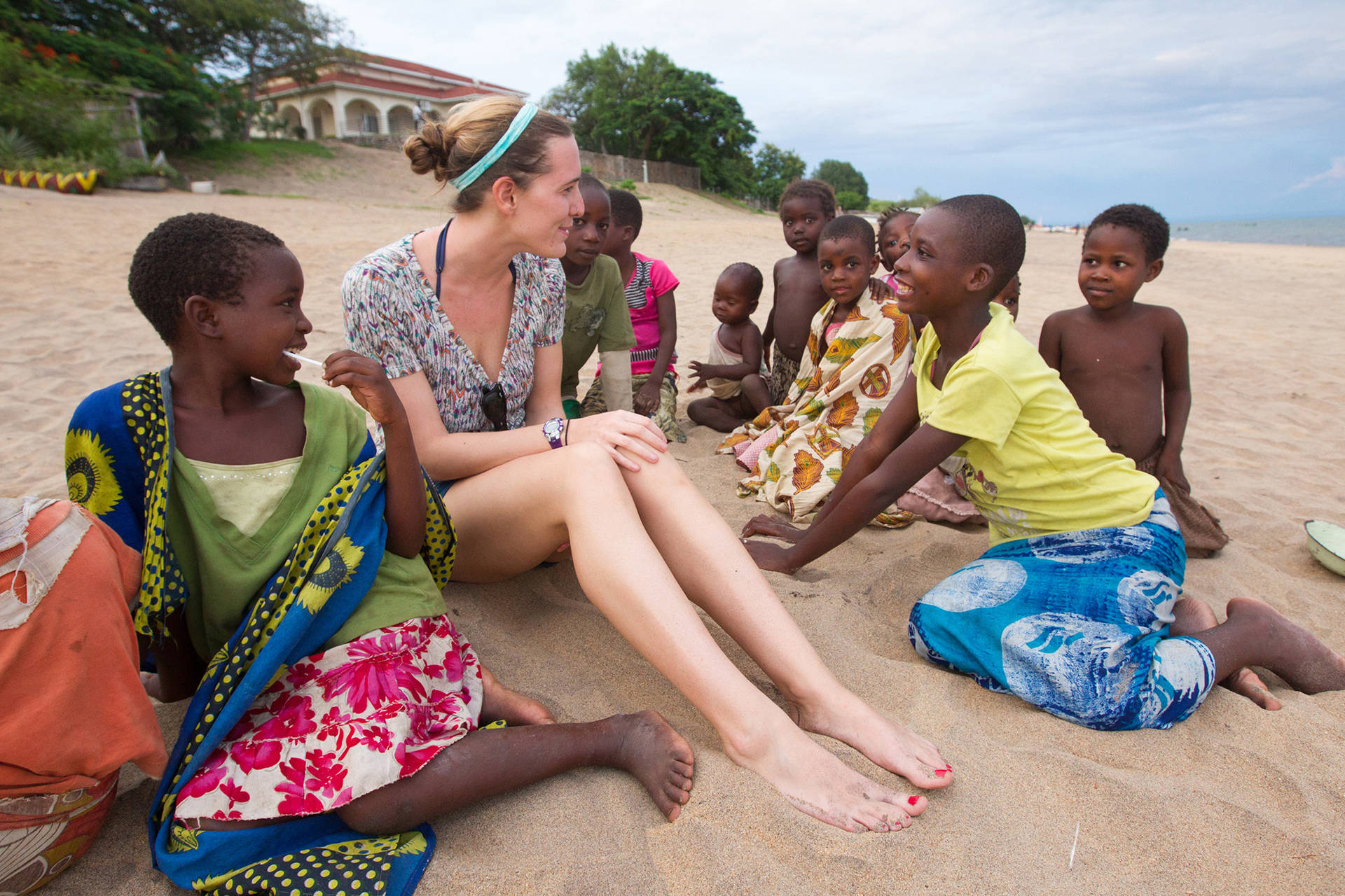 Malawi Foreign Student Visiting Locals Background