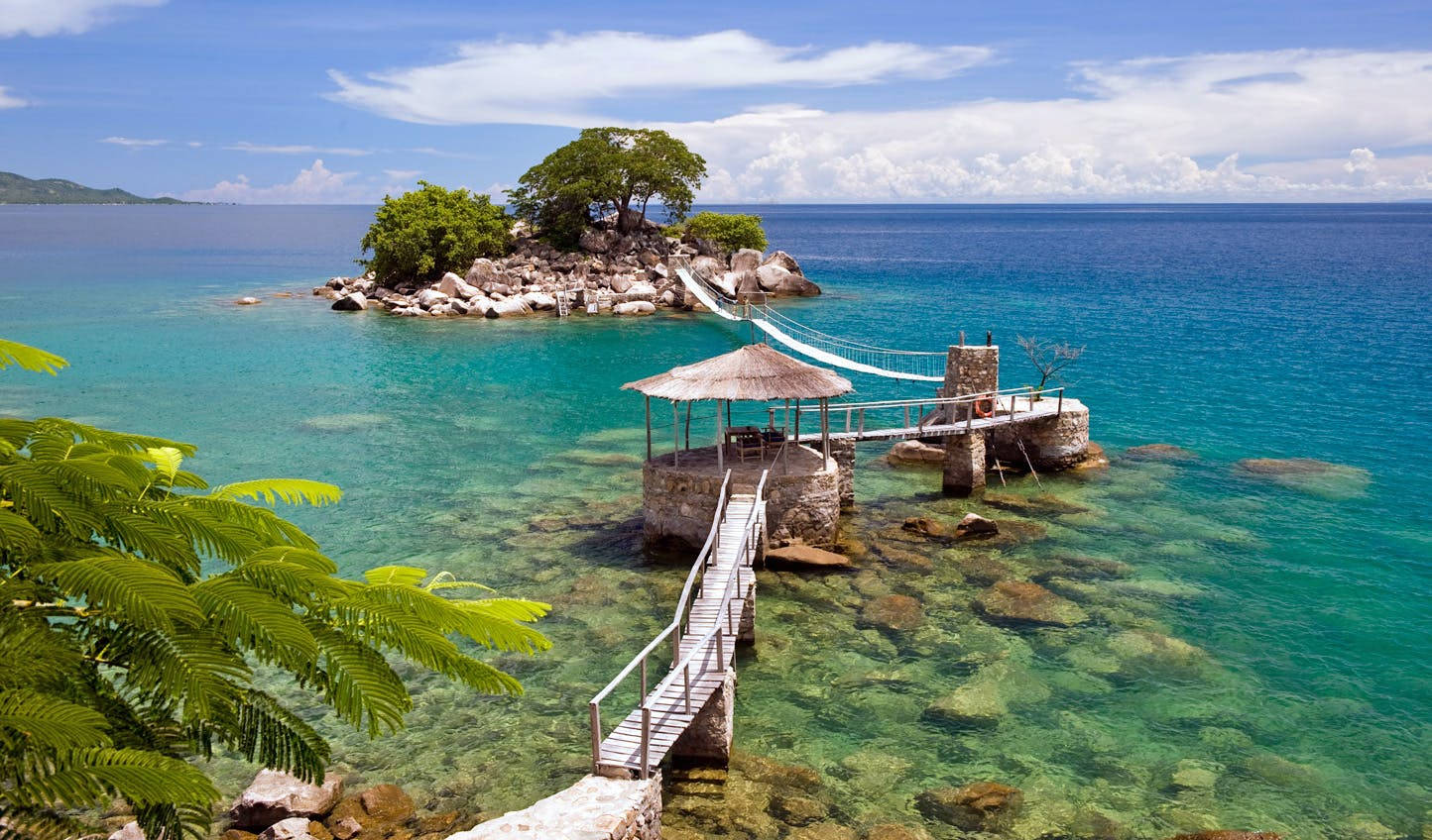 Malawi Hut On Water Background