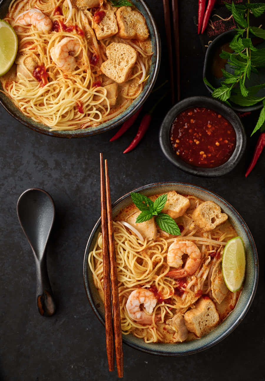 Malaysian Curry Laksa On Black Table