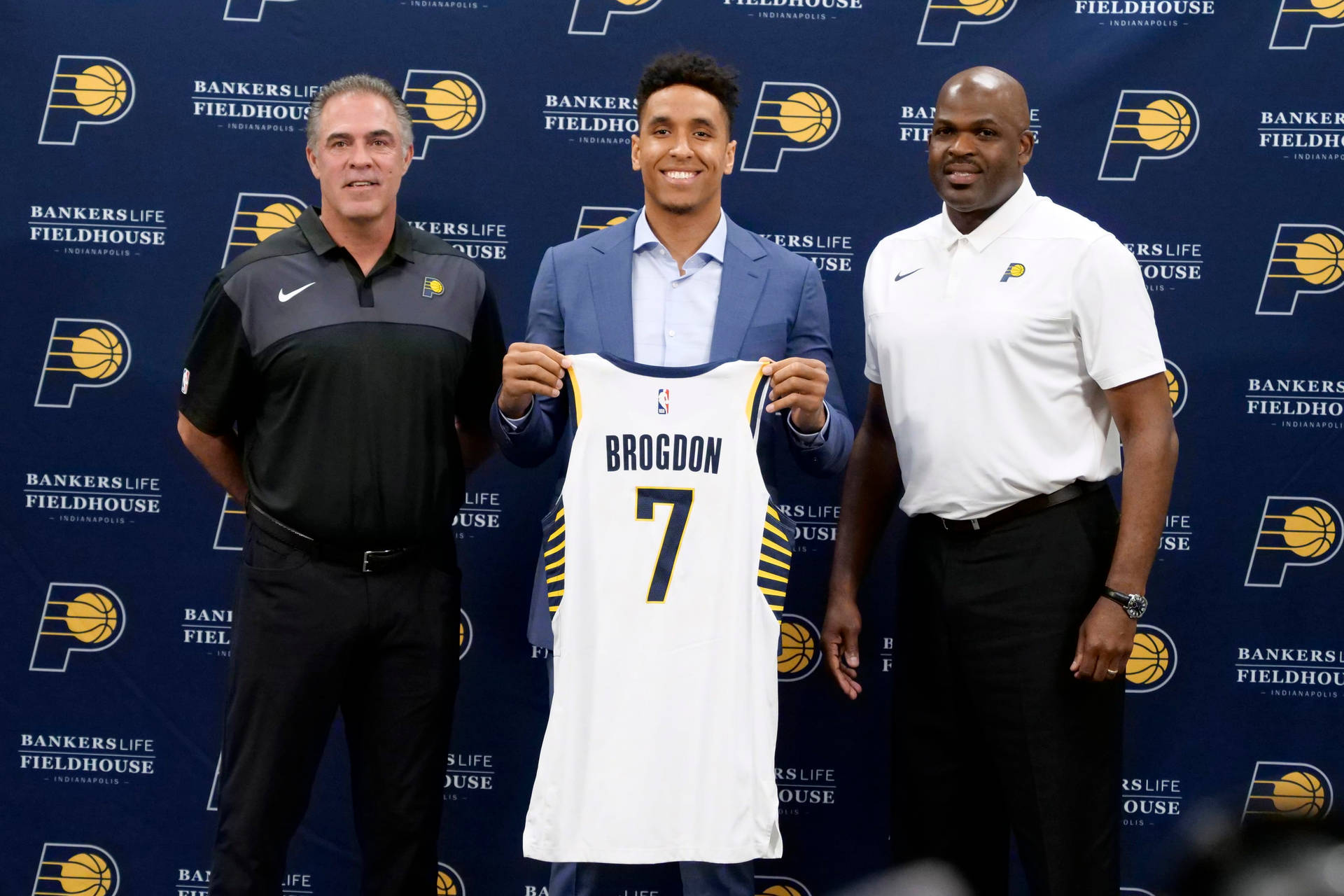 Malcolm Brogdon Holding His Jersey Background