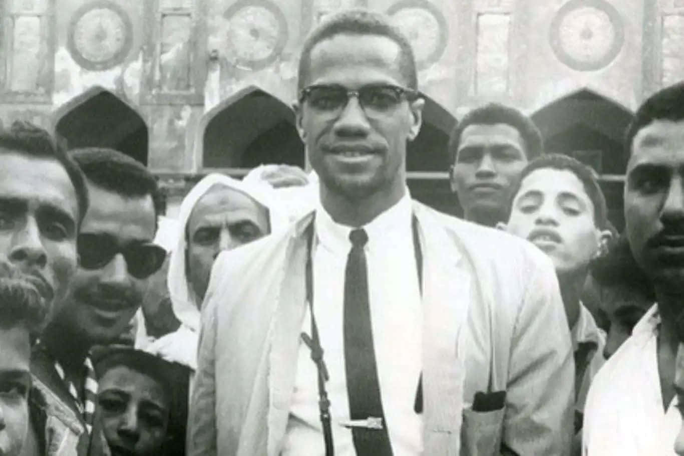 Malcolm_ X_ Among_ Crowd Background