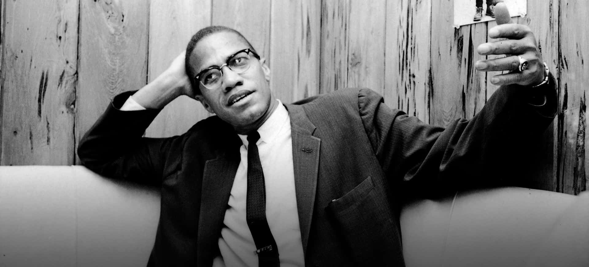 Malcolm X Contemplative Moment Background