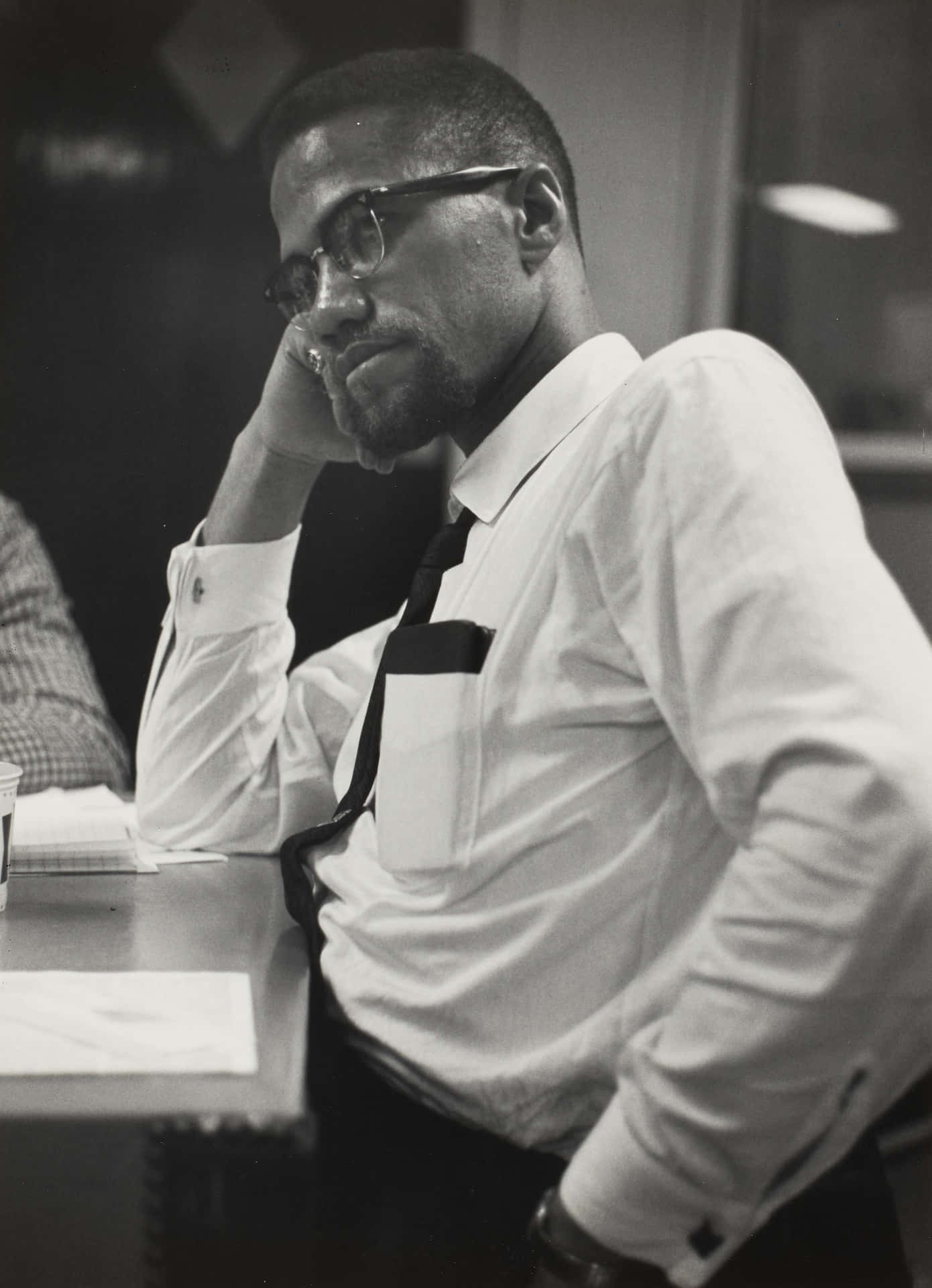 Malcolm X Contemplative Moment Background