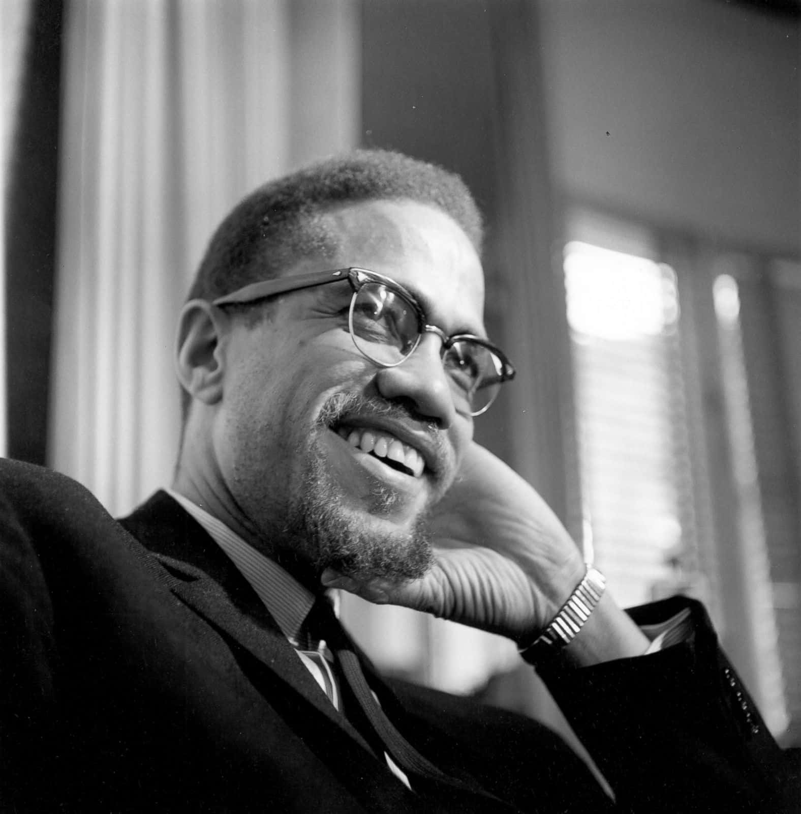 Malcolm X Smiling Portrait Background