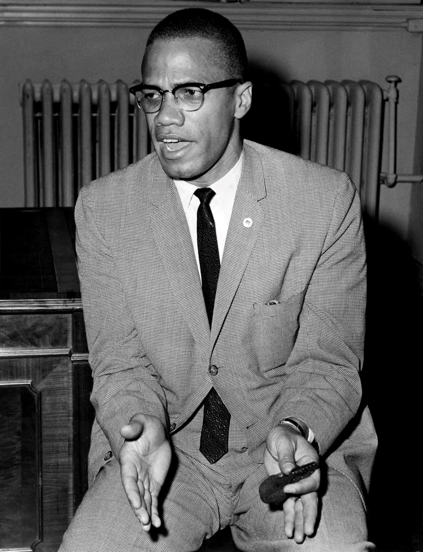 Malcolm X Speaking Blackand White Background