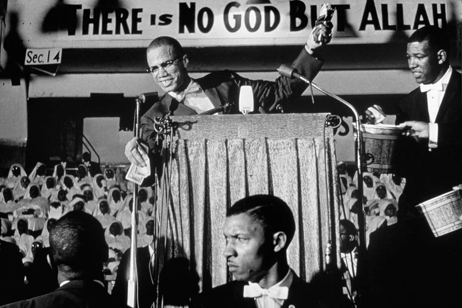 Malcolm X Speakingat Rally Background