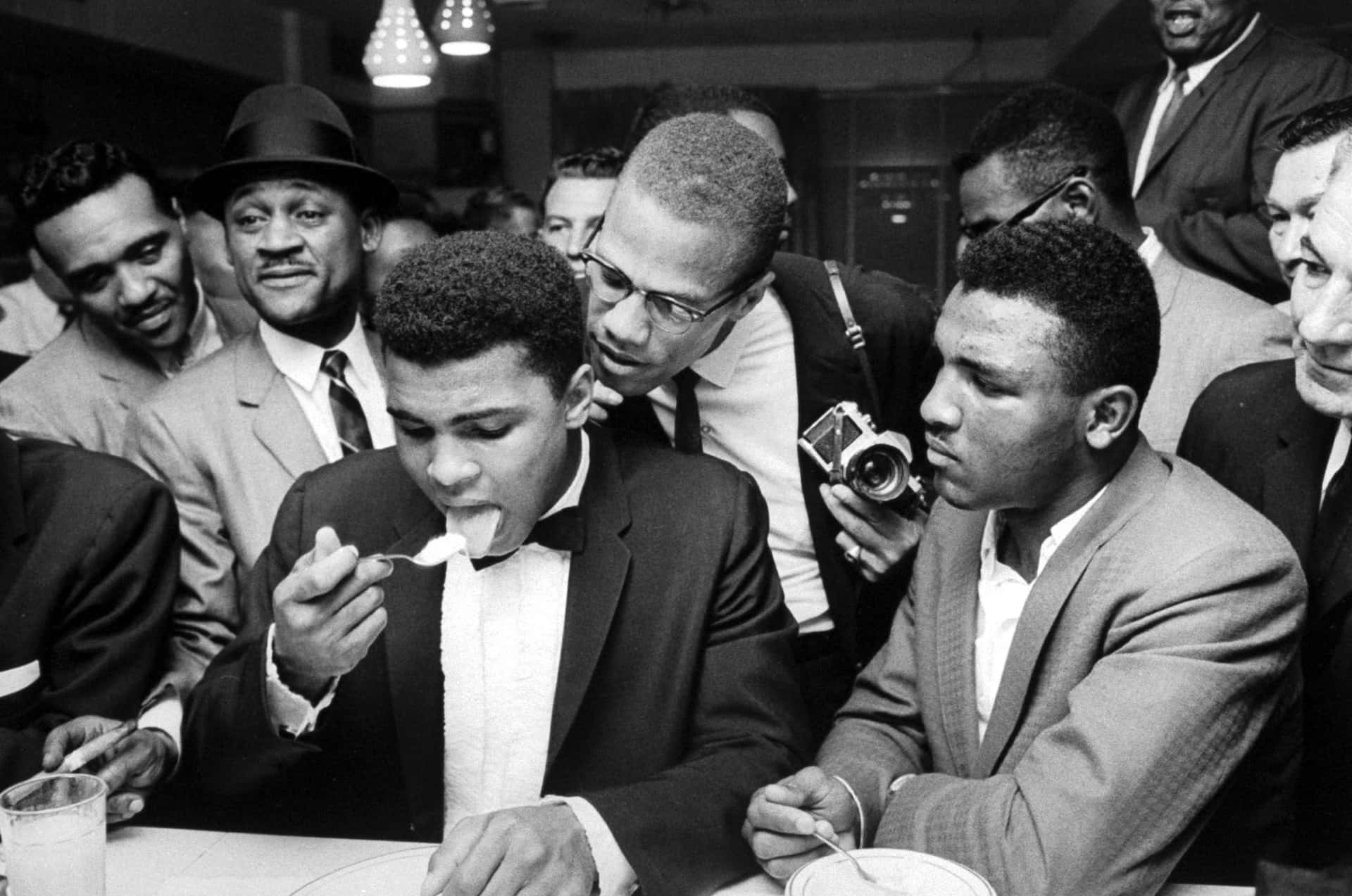 Malcolm Xand Muhammad Ali Background
