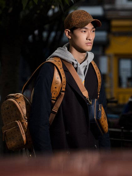 Male Model Carrying Mcm Bag