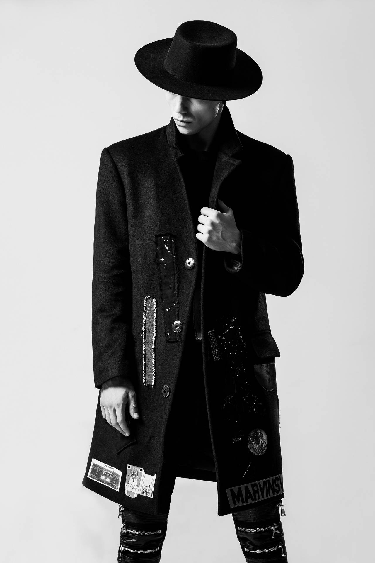 Male Model In Black Coat Background