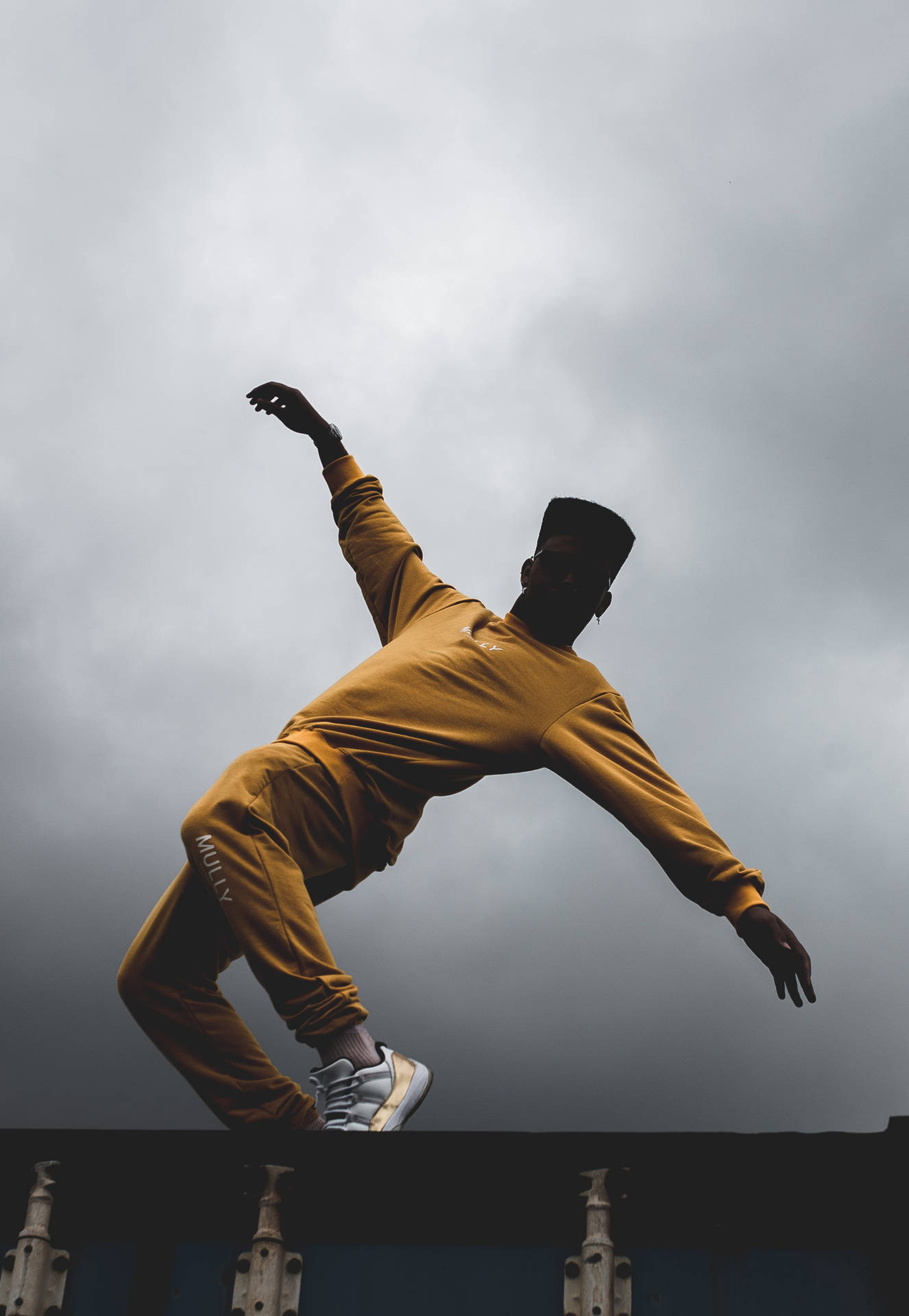 Male Pose Cloudy Day Background