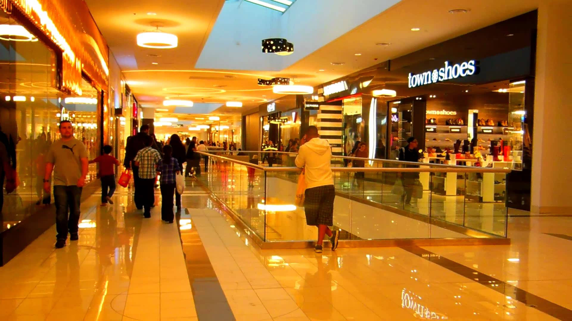 Mall With Elegantly Tiled Floor Background