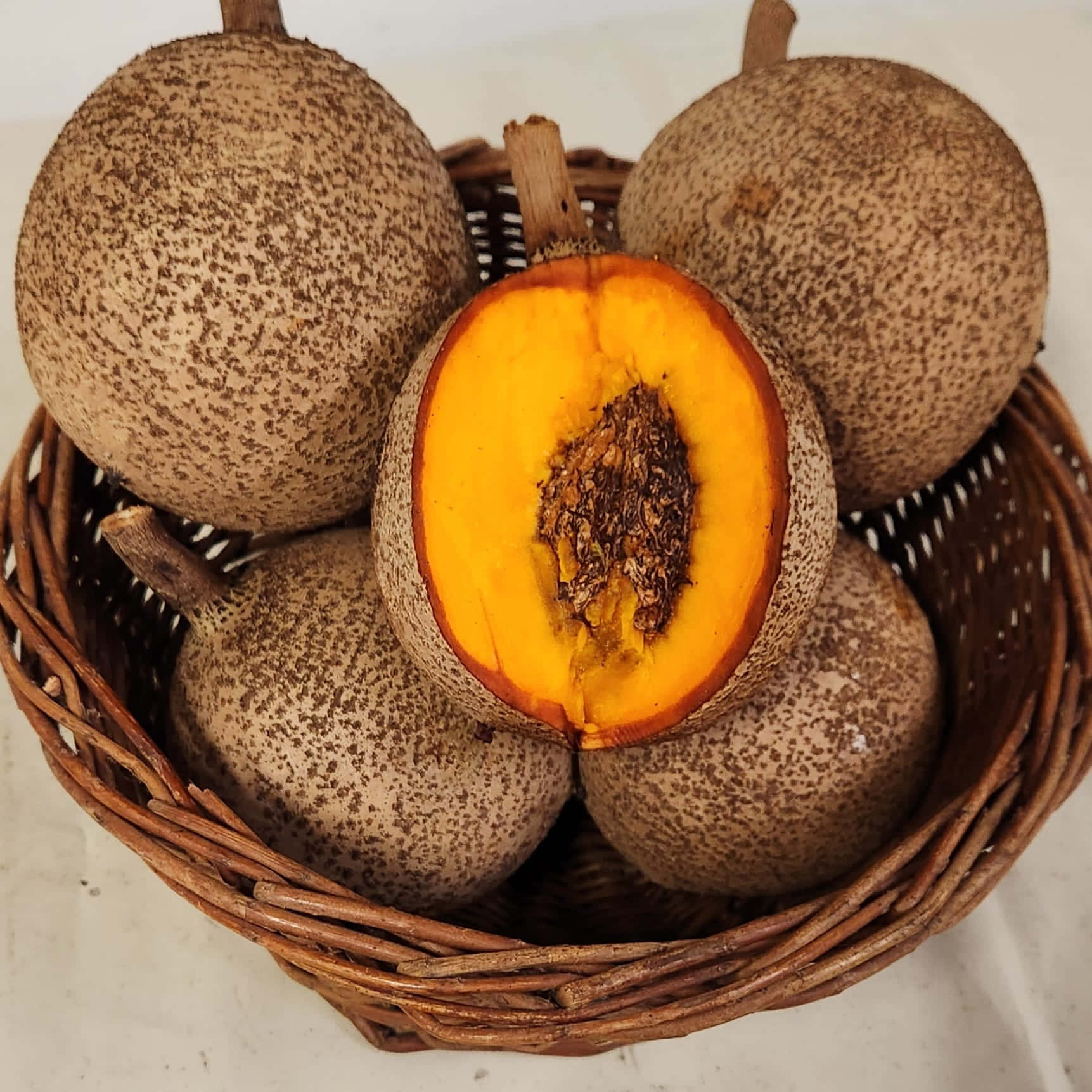 Mammee Fruit Basket Closeup Background