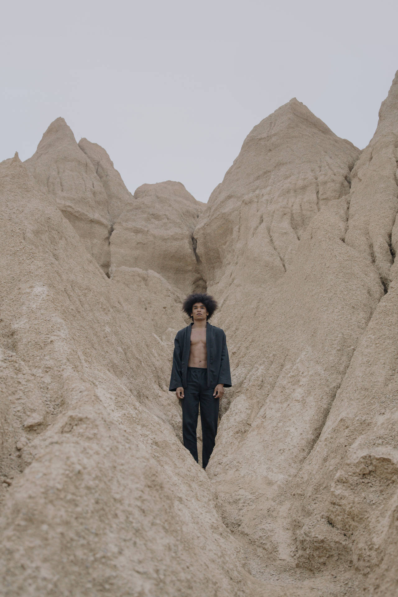 Man Aesthetic Among Cliffs Background