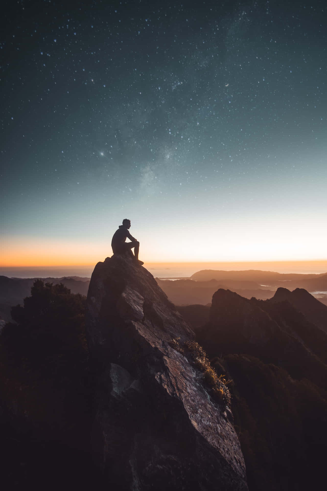 Man After Arduous Rock Climb Background