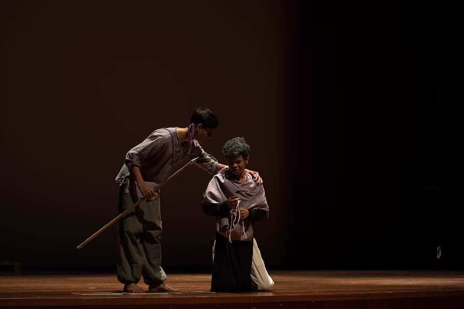 Man And Woman On Stage Acting