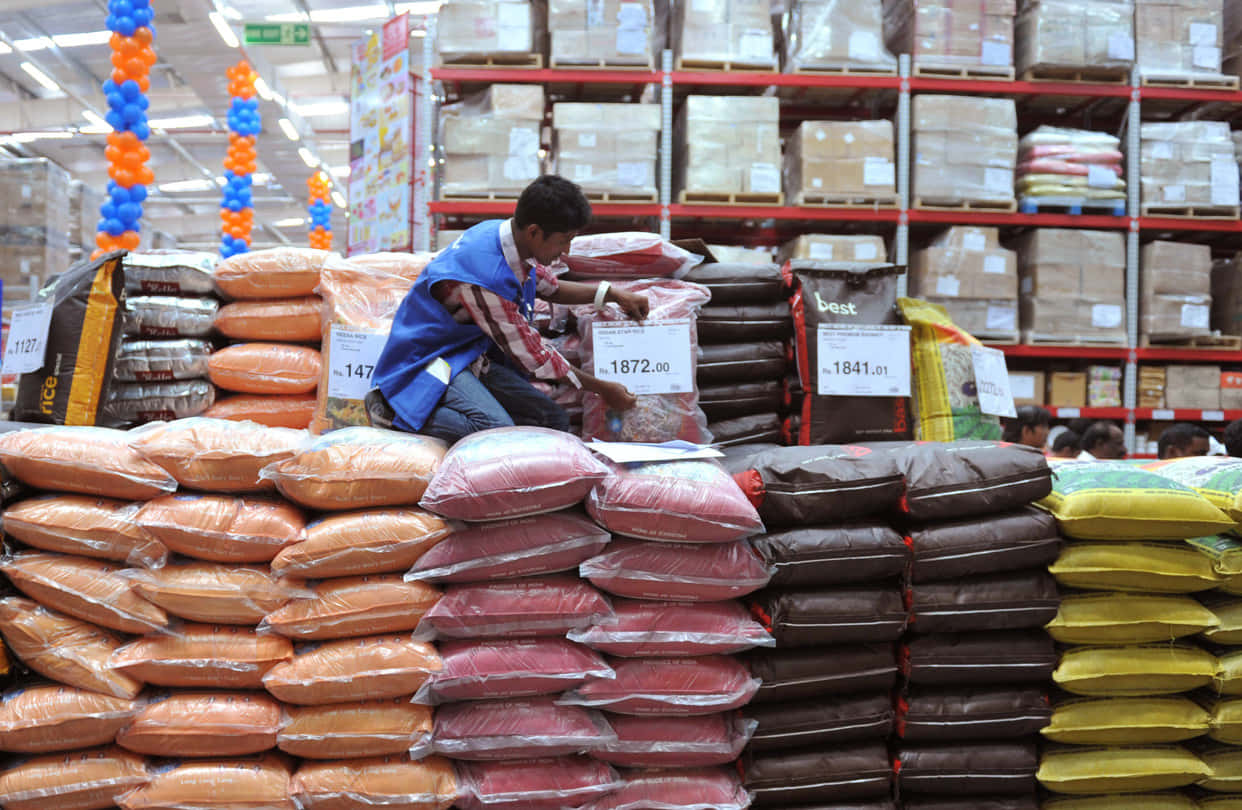 Man Arranging Wholesale Rice Products