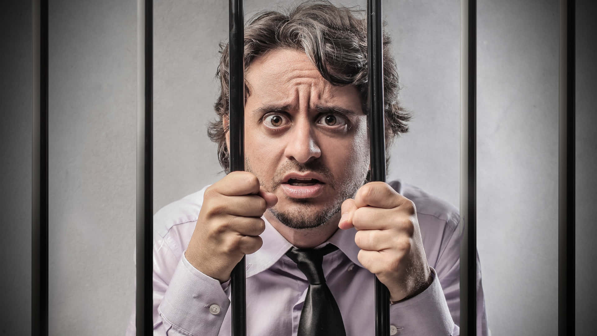 Man Behind Bars Expression