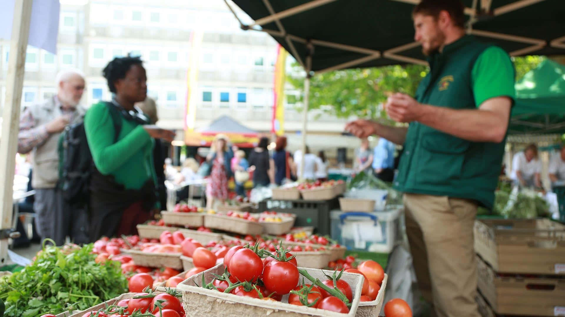 Man Buying From Local Market Stand