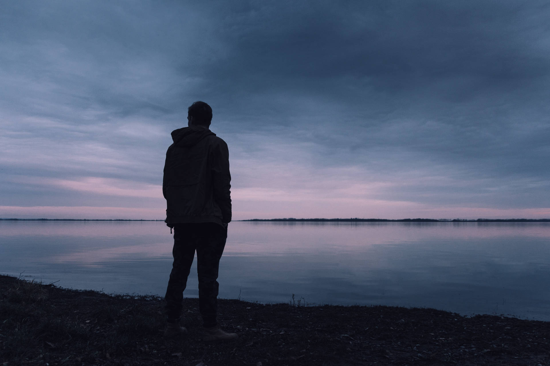 Man By Calm Waters Sad 4k Background