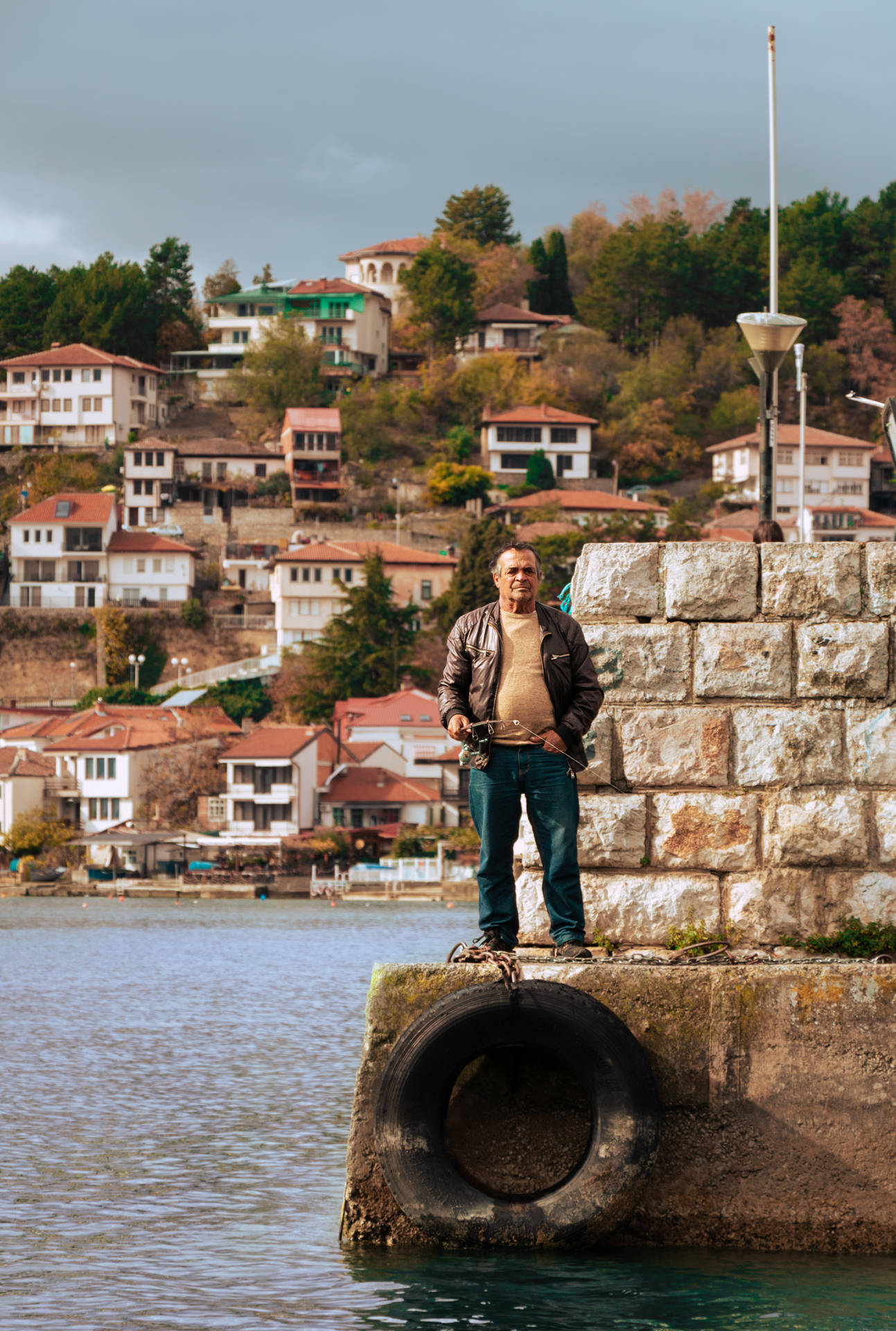 Man By The Bay In North Macedonia Background