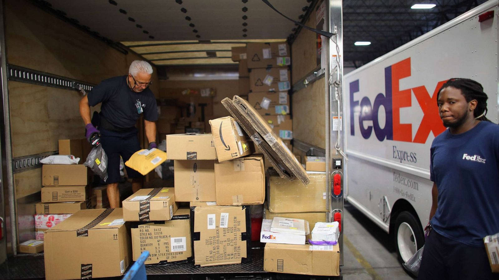 Man Checking Fedex Packages Online