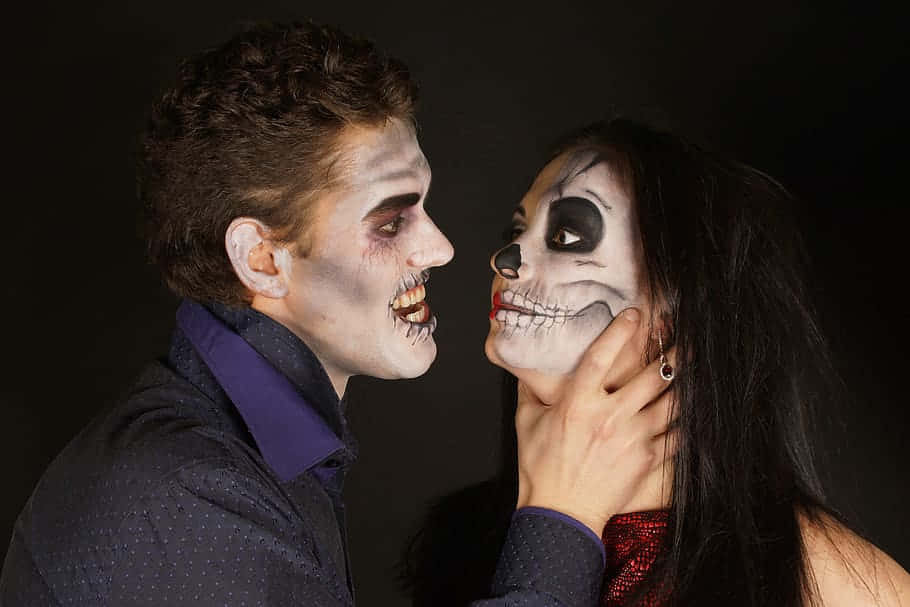 Man Choking A Woman With Face Paint Background