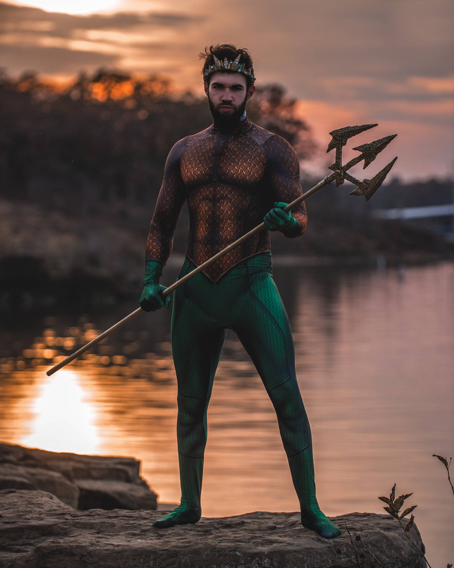Man Cosplaying As Aquaman Background