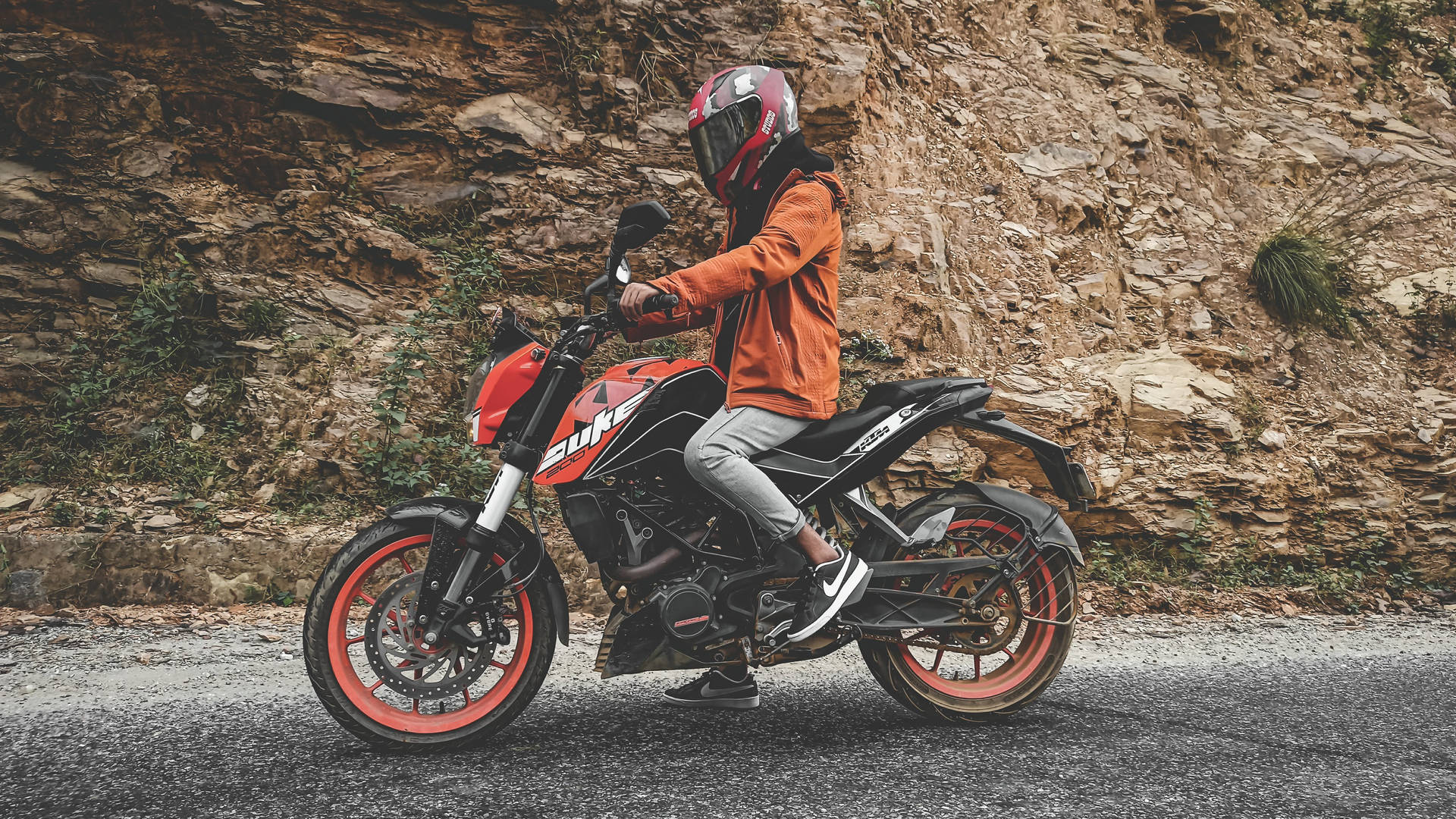 Man Driving A Ktm Duke 200