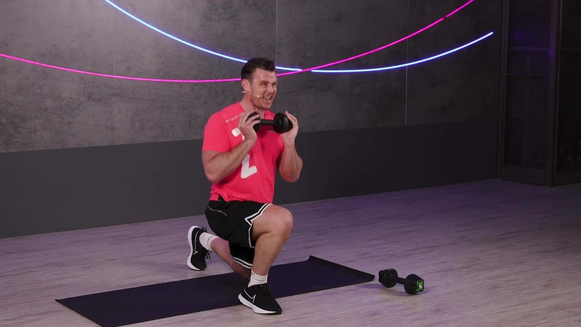 Man Executing Unilateral Workout Background