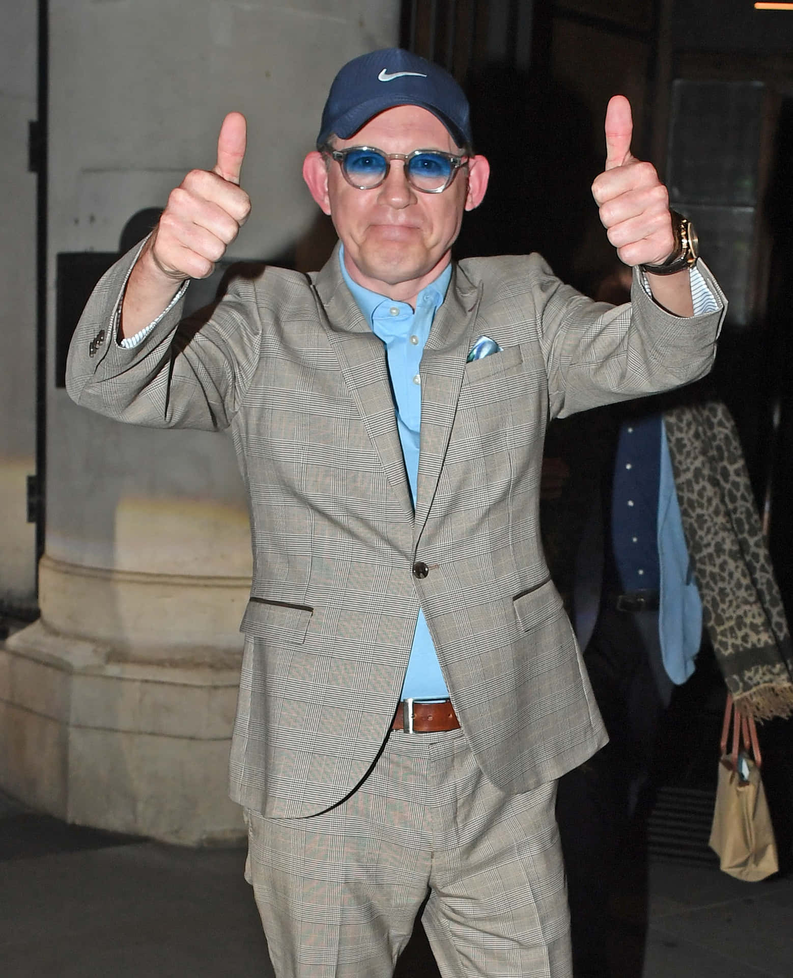 Man Giving Double Thumbs Up Background