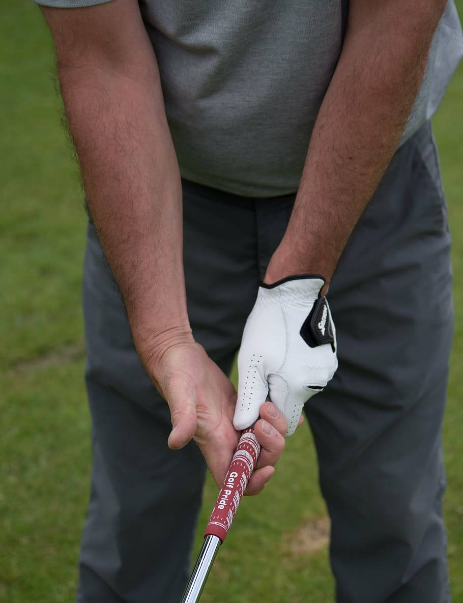 Man Holding A Club Golf Phone Background