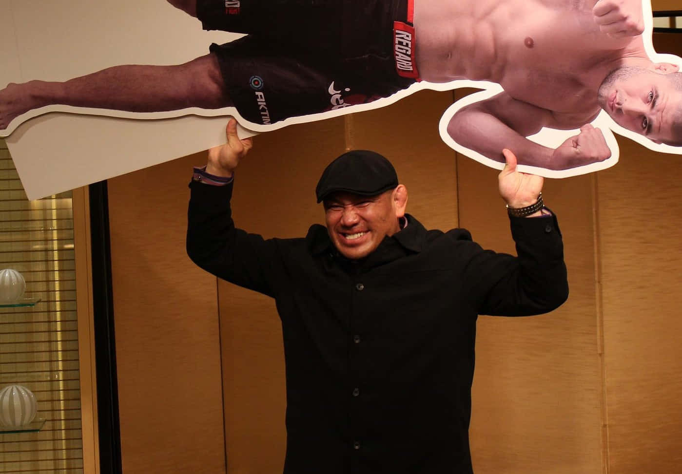 Man Holding Cutoutof Fighter Background