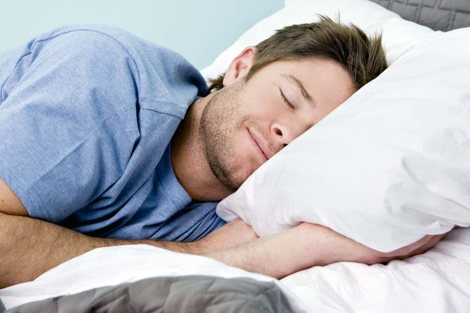 Man In A Blue Shirt Sleeping Background