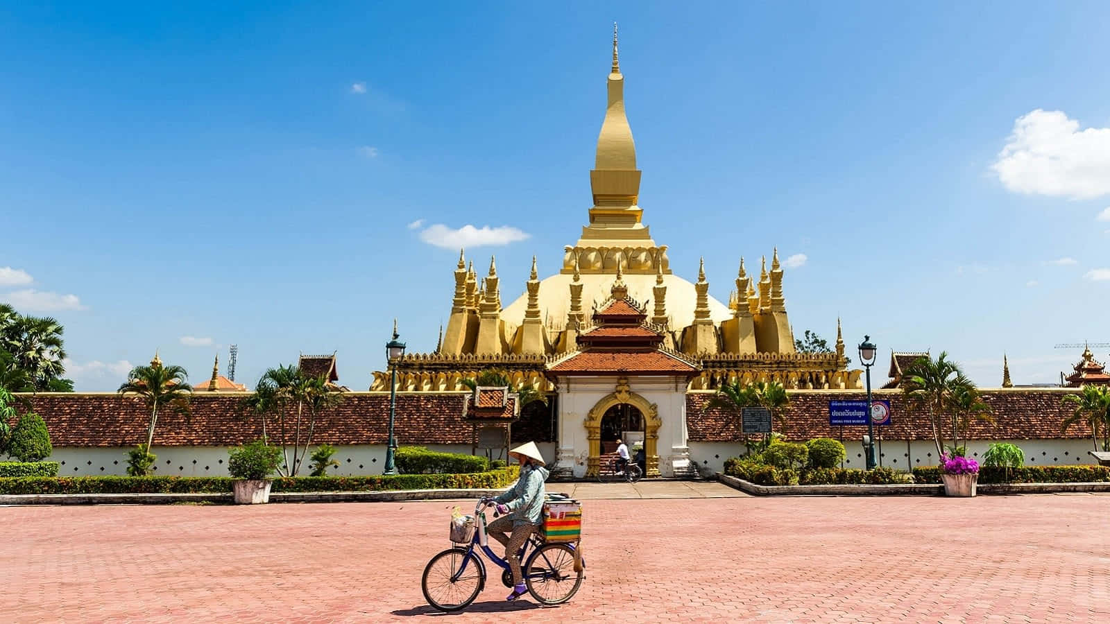 Man In Bike In Vientiane Background
