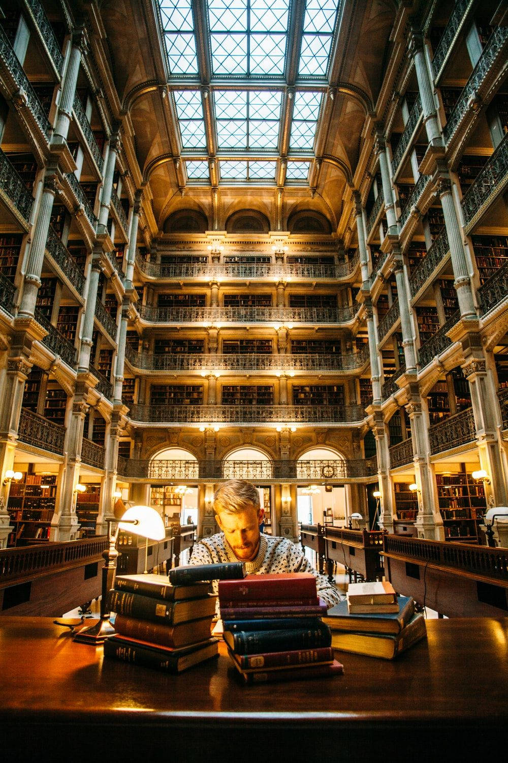 Man In Library Studying Background