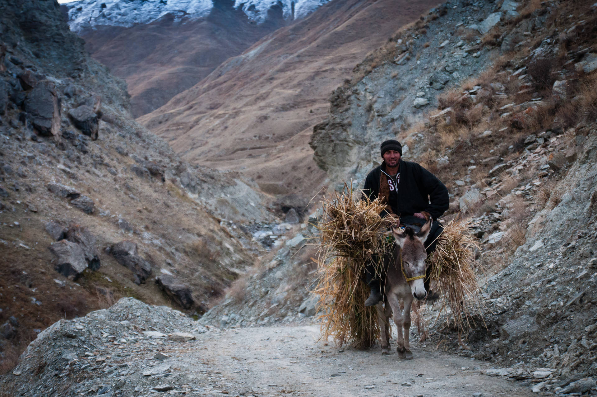 Man In Tajikistan Mountain Background