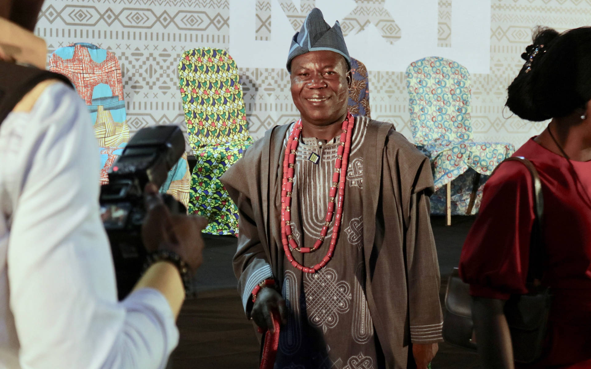 Man In Traditional Nigerian Agbada Robe Background