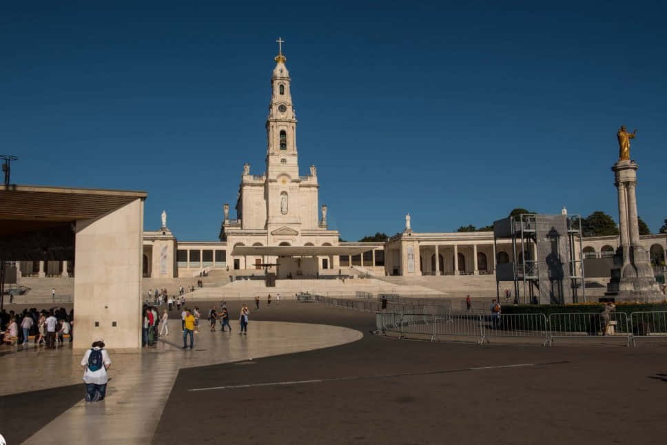 Man Kneeling At Fatima Sanctuary