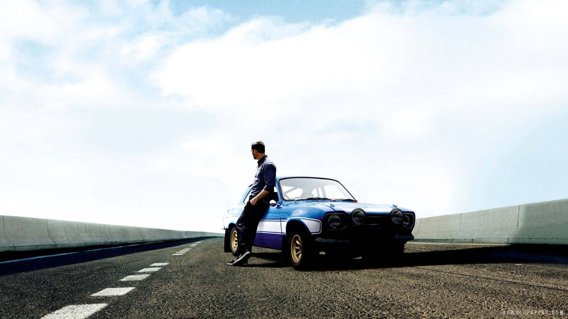 Man Leaningon Classic Caron Open Road Background