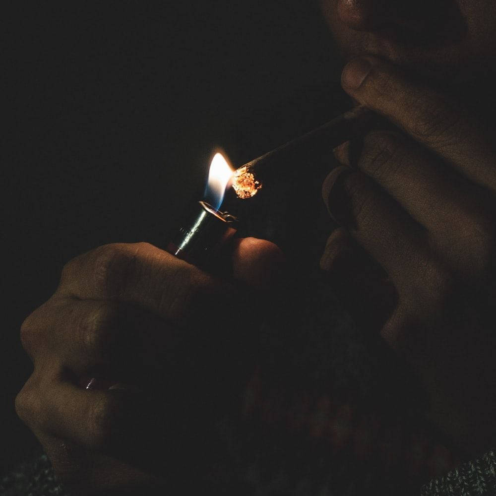 Man Lighting Up Blunt