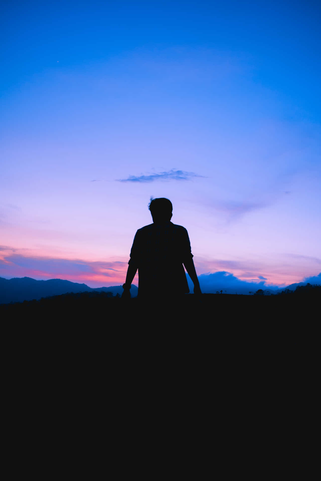 Man Looking At Glorious Sky Background
