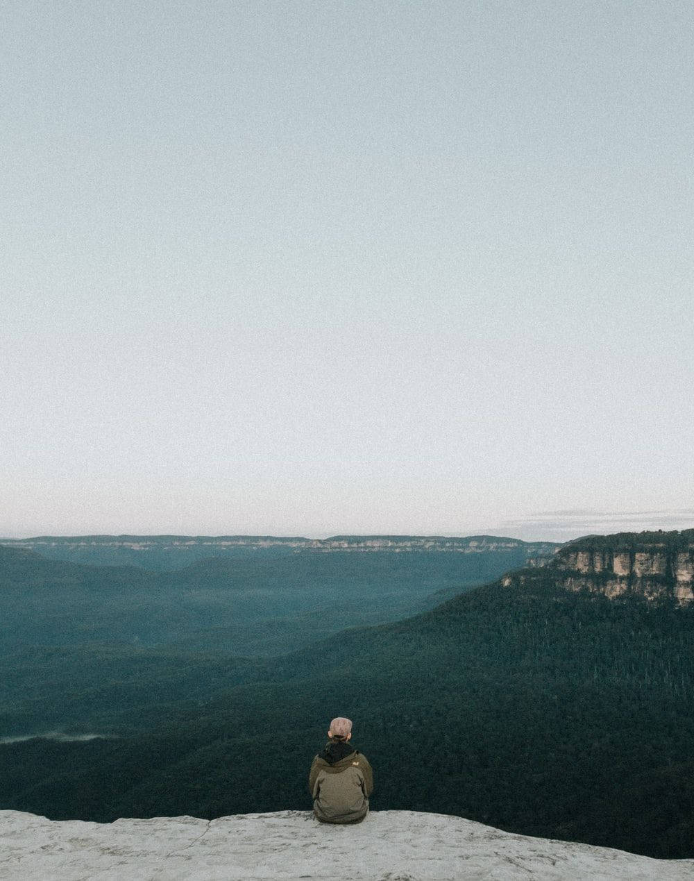 Man On A Cliff Indie Phone Background